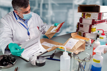 Forensic police check files against evidence in crime lab, conceptual image