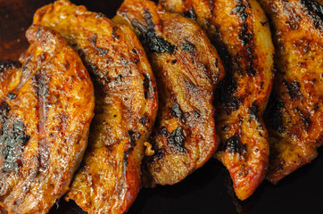 Fresh and juicy pork loin steaks,  grilled meats on the wooden board