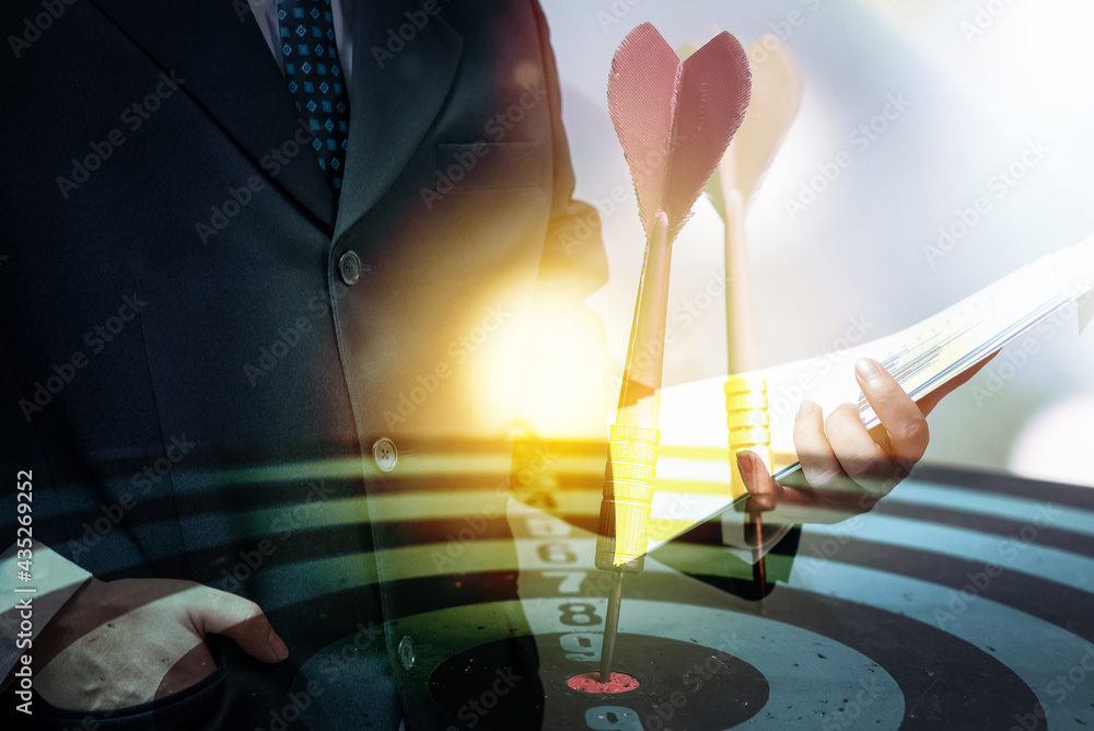 Poster bullseye is a target of business. dart is an opportunity and dartboard is the target and goal. so bo