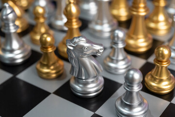 Chess board game to represent the business strategy with competition in the world market. and find out the best solution to meet target objective and goal. Sign and symbol of challenging as concept.	
