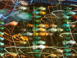 Abstract background of a variety of colorful lights lines and spots