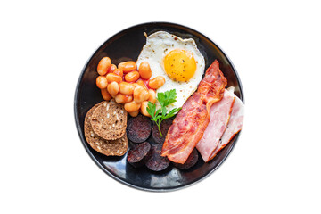 english breakfast fried egg fresh black pudding blood sausage, cereal bread, beans, bacon, scrambled eggs food healthy meal snack copy space food background rustic top view