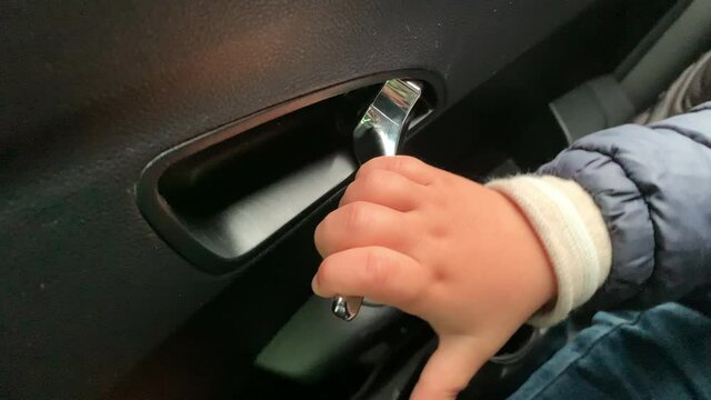Baby unable to open car door handle because of child lock