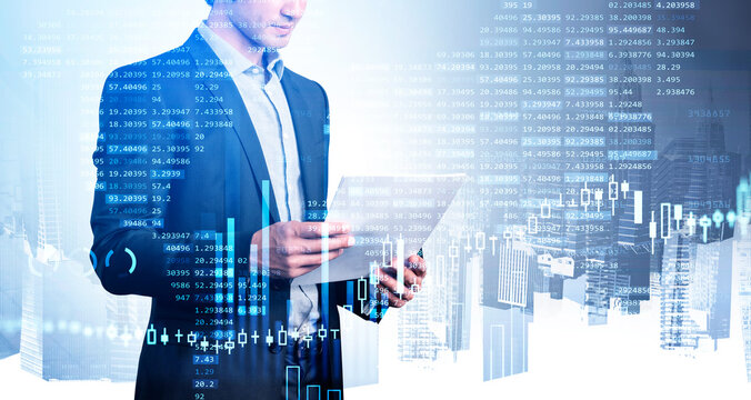 Businessman reading business paper, skyscrapers and candlesticks