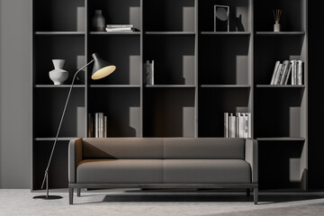 Living room interior with grey sofa, bookshelf concrete floor. Concept of cozy meeting reading place. 3d rendering