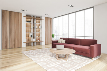Luxurious bright living room interior with elegant furniture and red couch, in residential apartment. Modern concept for design and architecture. Singapore city view. Panoramic window.