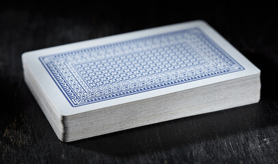 Poker cards on wooden table. Deck of cards.