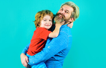 Fathers day. Dad hugs with little son. Family relationships. Parentship concept.