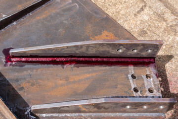 Apply Liquid Penetrant into the welded so that the liquid penetrat into the defect for Non-Destructive Testing(NDT) with process Penetrant Testing(PT).