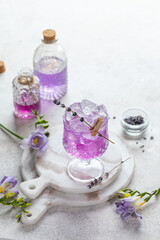Lavender cocktail on a vintage white background, selective focus