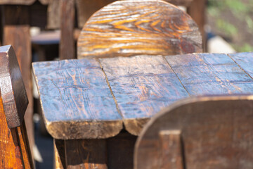 Antique table with dark wood chairs.