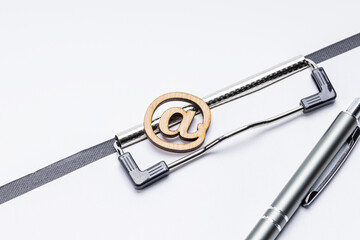 business contact form concept. email symbol on clipboard with empty space for text over white table. support service illustration