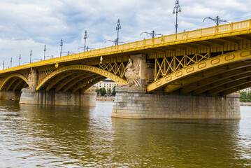 The yellow Margaret Bridge over the Danube River in Budapest, Hungary