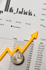 investment report, financial quarterly report, money on a printed sheet of a quarterly report and...