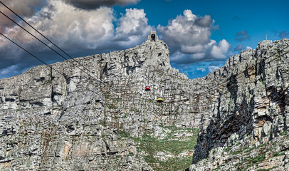Table mountain cable car with a wide view towards the top cable way station - Great outdoors adventure and travel holiday destination, Cape Town, South Africa