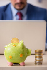 Young man earning money via Internet in retirement concept