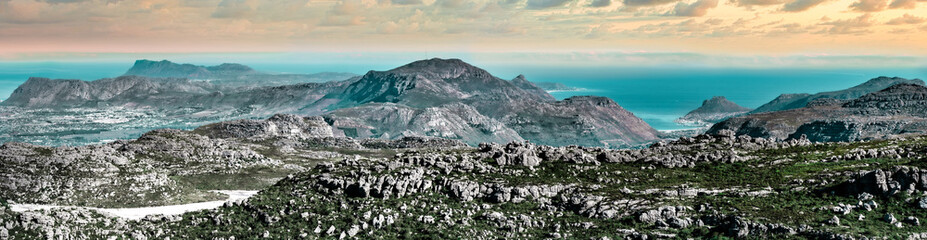 Dramatic panorama from atop Table mountain, looking out towards the Southern coast of Africa - Great outdoors adventure travel destination, Cape Town, South Africa