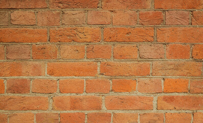 Simple hand made brick wall. Detailed photo of brickwork.