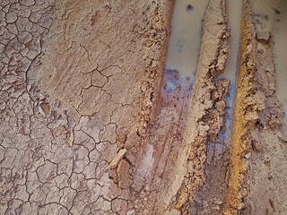 motocross wheel trail on the ground or abstract wheel trail background, sweet dreamy, soft focus