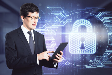 Cyber security concept with businessman using digital tablet on virtual screen backdrop with glowing lock icon and circuit around.