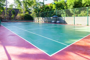 New concrete tennis courts available. With the morning sun