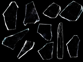 A SET OF GLASS FRAGMENTS ISOLATED ON A BLACK BACKGROUND