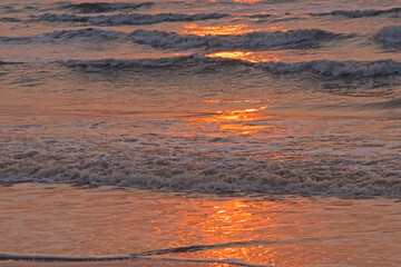 Fototapeta na wymiar Sunset at sea , reflection shadow of sun on sea