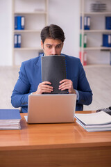 Young businessman employee working in the office