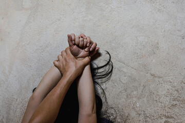 Male hand holding a woman hand for rape and sexual abuse. Image for rape and sexual abuse...