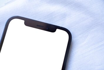 smartphone mockup in a half screen. a close up view of a smartphone with white space screen on...