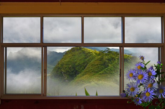 Fototapeta Beautiful mountain and fog in window view of resort
