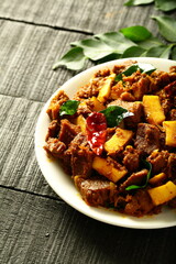 Plate of famous beef fry, roast Kerala recipes, cuisine.