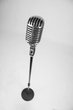 Vintage microphone for singing. Characteristic microphone of the 50s. Silver microphone.