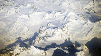 snow-covered Himalaya mountains view from the plane