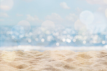 Abstract seascape with sand, tropical beach background. blur bokeh light of calm sea and sky....