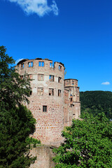 An old castle in Heidelberg, red and round in the woods