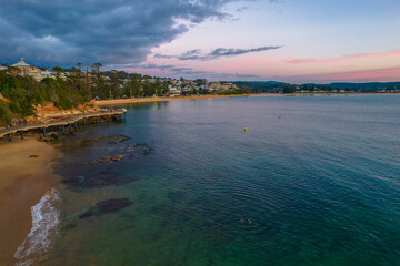 Aerial sunrise seascape with storm clouds rolling in