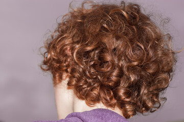 Naklejka premium curly hair of medium length red color