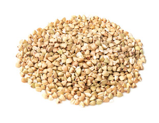 handful of green buckwheat grains closeup on white