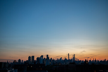 Fototapeta na wymiar New York City Skyline Silhouette At Dusk