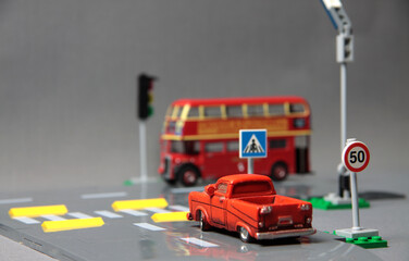 Naklejka premium Road safety concept - crossroad with traffic signs and cars