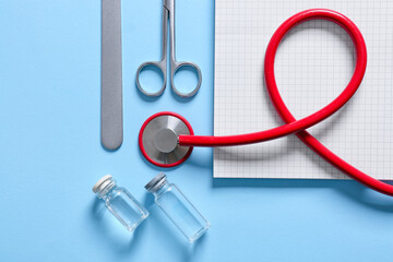 Composition with modern stethoscope on color background, closeup