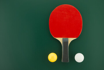 Table tennis equipment on green background