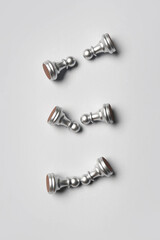 Chess pieces on grey background