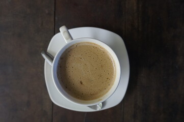 cappuccino served with fried fries for coffee break at the office
