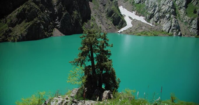 Mountain Lake of green and blue color Urungach. Located in Uzbekistan, Central Asia. 8 out of 20