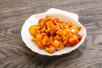 Marinated pickled honey mushrooms in the bowl