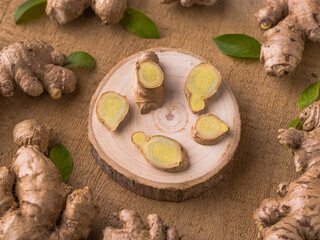 Fresh Ginger on wooden background stock image.