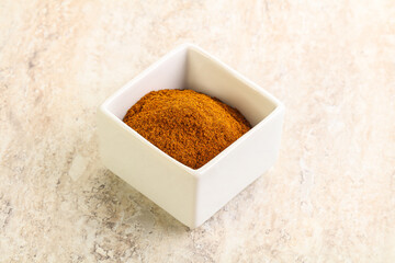 Dry Paprika powder in the bowl