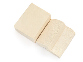 Tofu cheese isolated on white background. Diced tofu cutted in a slices  Top view. Flat lay. Food concept..